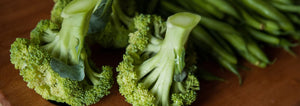 broccoli on a cutting board